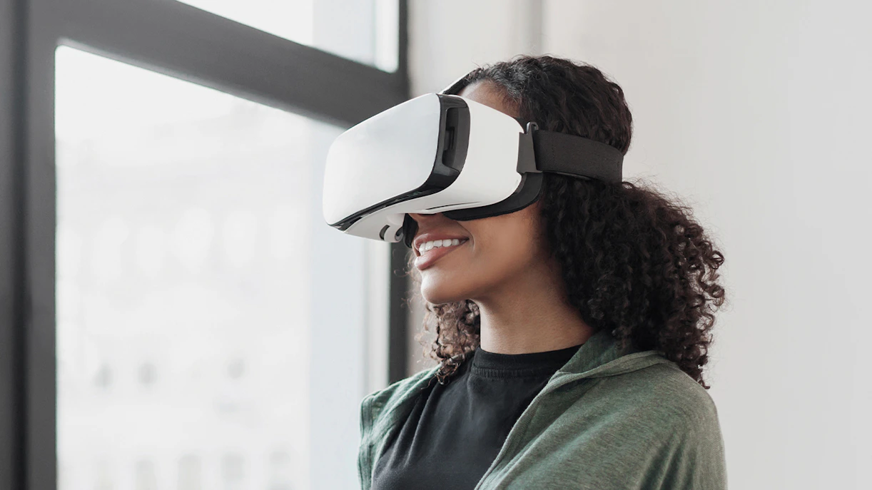 Woman experiencing virtual reality at Berlin TV Tower.