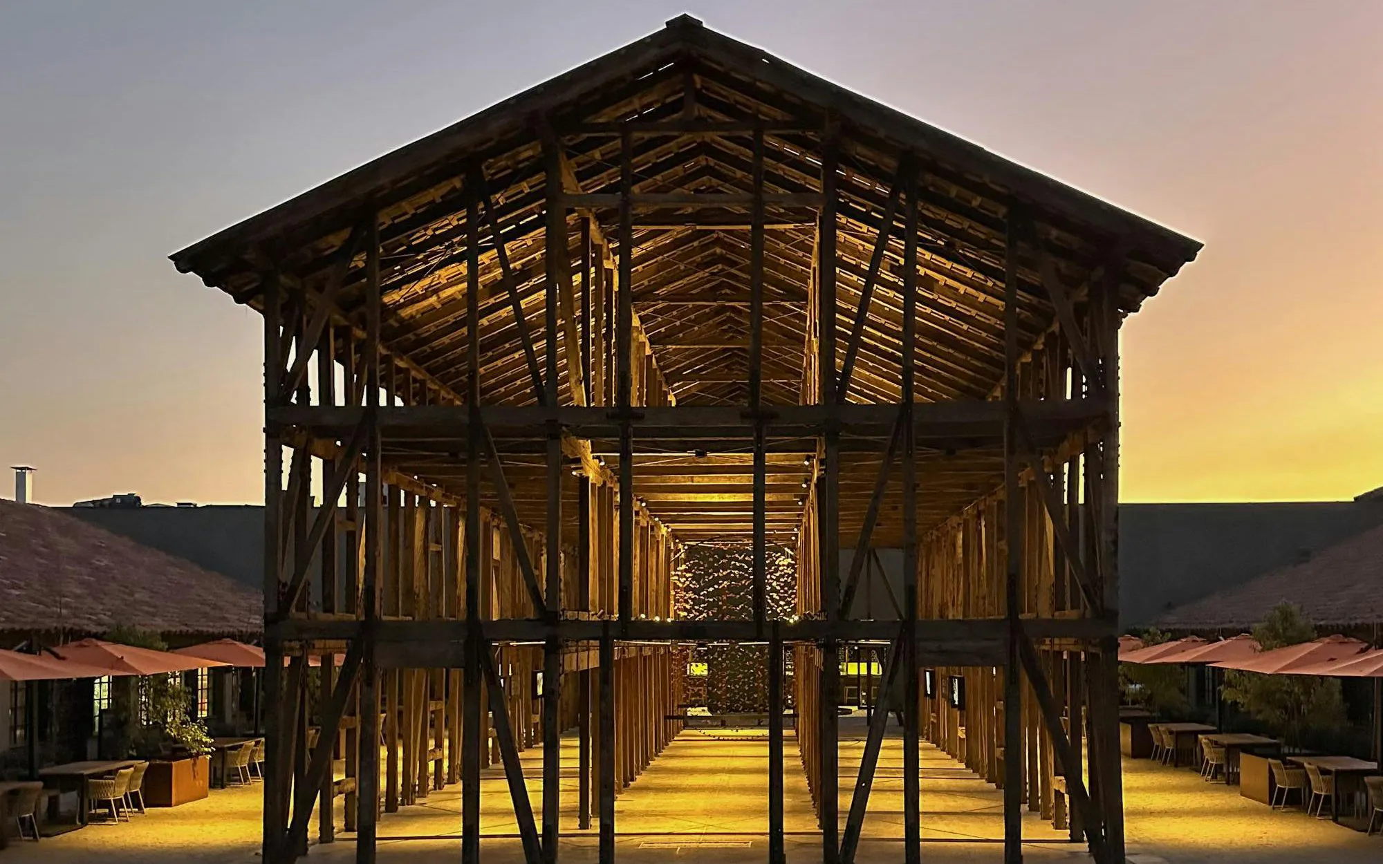 Wooden structure at Viña Concha y Toro wine center during sunset in Santiago, Chile.
