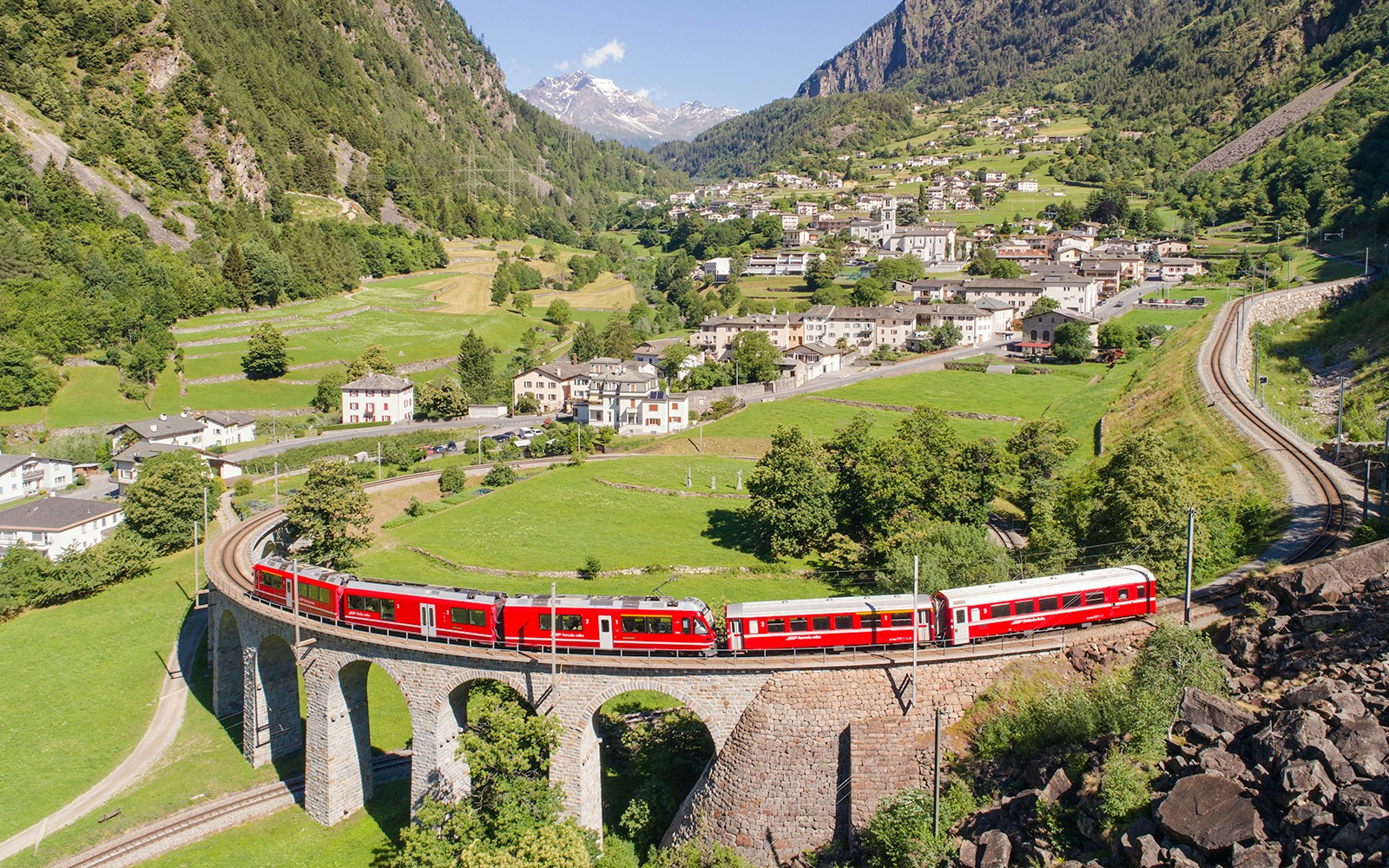 Scenic view from the Bernina Express train tour in Switzerland, showcasing the breathtaking alpine landscape