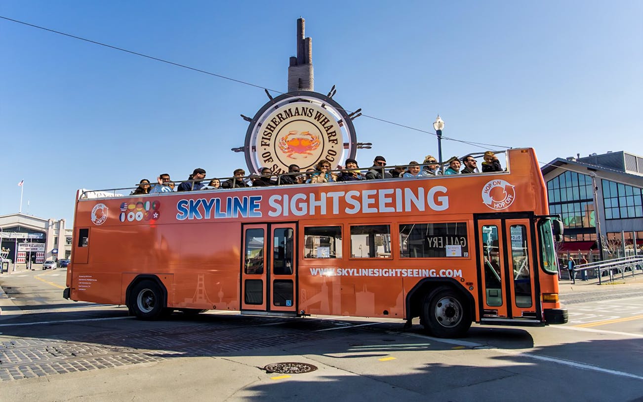Open-top tour bus at Fisherman's Wharf, San Francisco.