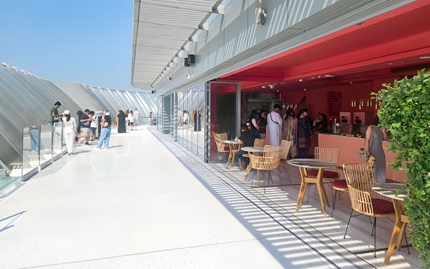 Visitors enjoying the observation deck and cafe at The View at The Palm, Dubai.