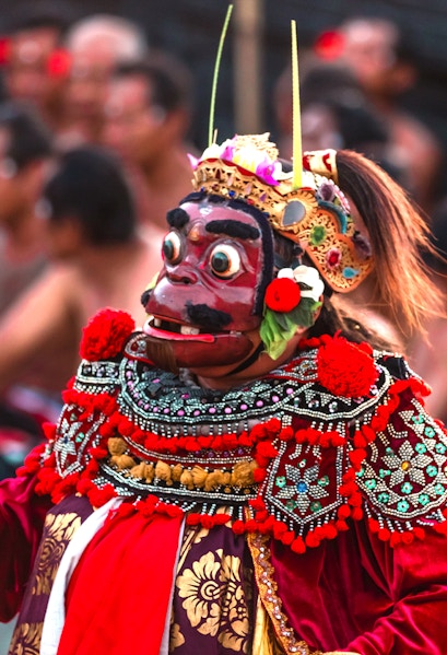 Performer in traditional costume at Uluwatu Kecak Fire Dance, Bali.