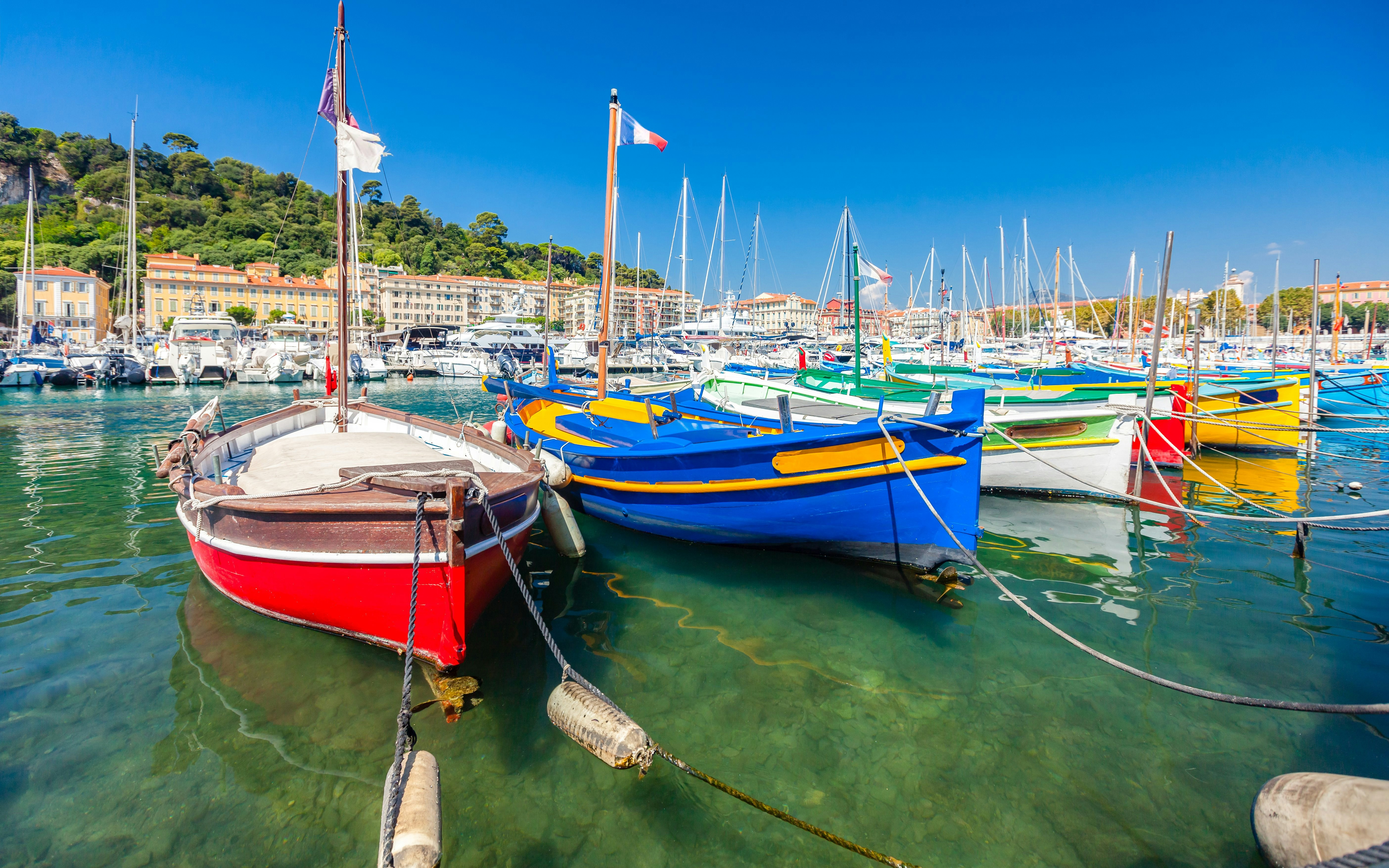 Colorful pointu boats docked in Port Lympia, Nice.