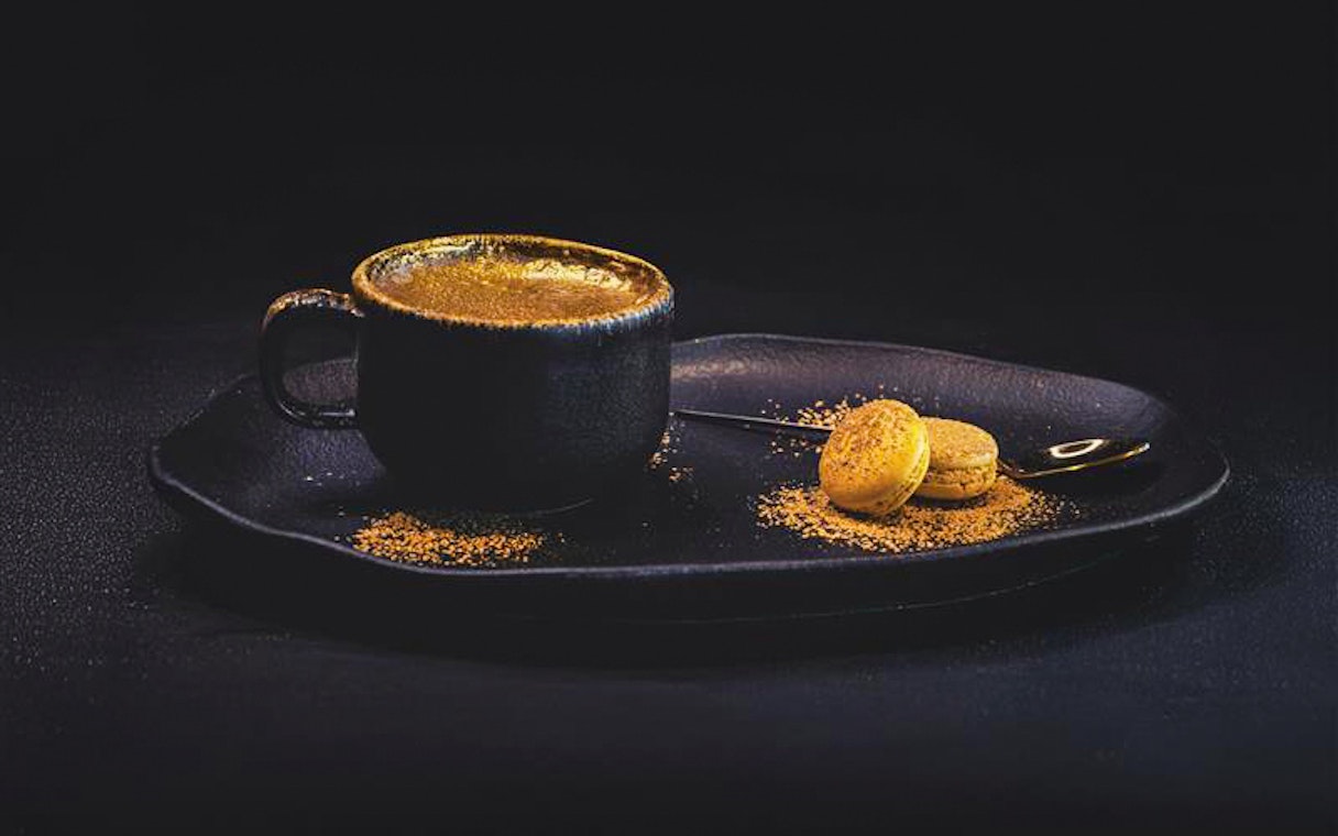 Coffee with gold dust and macarons at Sky 52 Restaurant, Sky View Observatory, Dubai.