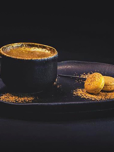 Coffee with gold dust and macarons at Sky 52 Restaurant, Sky View Observatory, Dubai.
