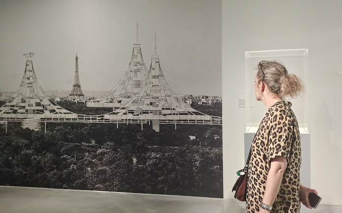 Centre Pompidou Malaga visitor viewing architectural exhibition interior.