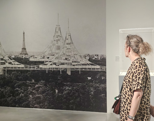Centre Pompidou Malaga visitor viewing architectural exhibition interior.