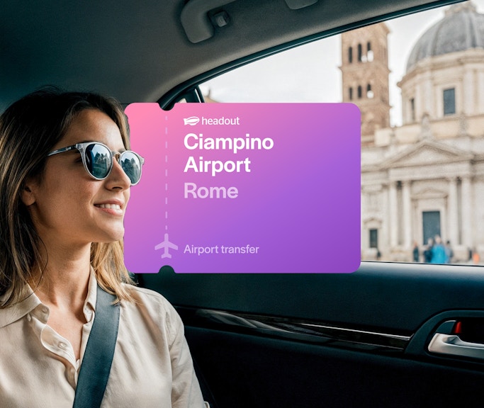 Woman in car during airport transfer from Ciampino Airport, Rome, with city view.
