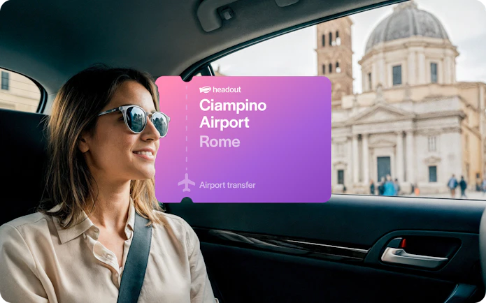 Woman in car during airport transfer from Ciampino Airport, Rome, with city view.