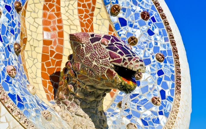Colorful mosaic lizard sculpture in Park Güell, Barcelona.