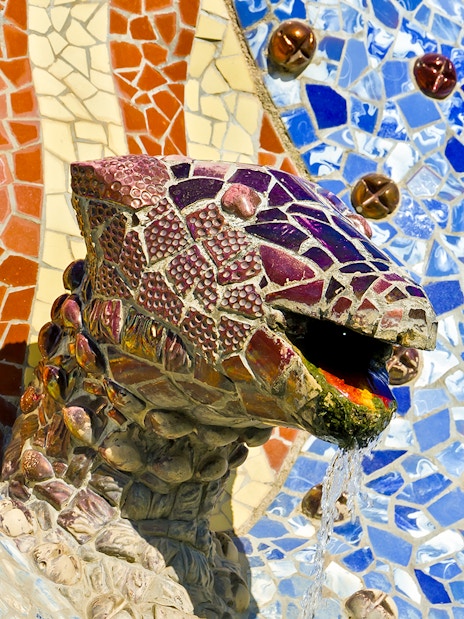 Colorful mosaic lizard sculpture in Park Güell, Barcelona.
