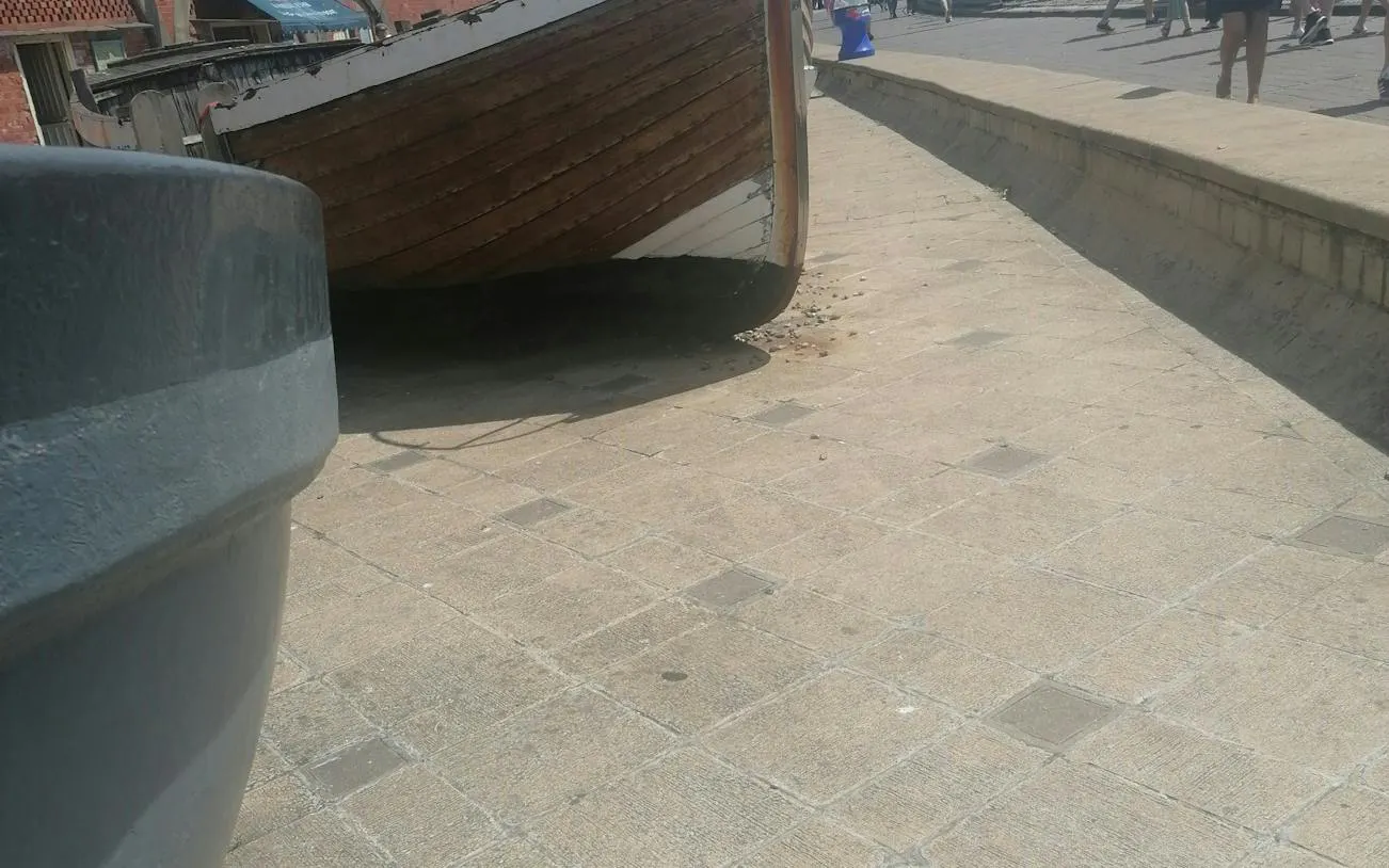 Boat on a paved area in Brighton, part of the Gone With the Tide city exploration game.