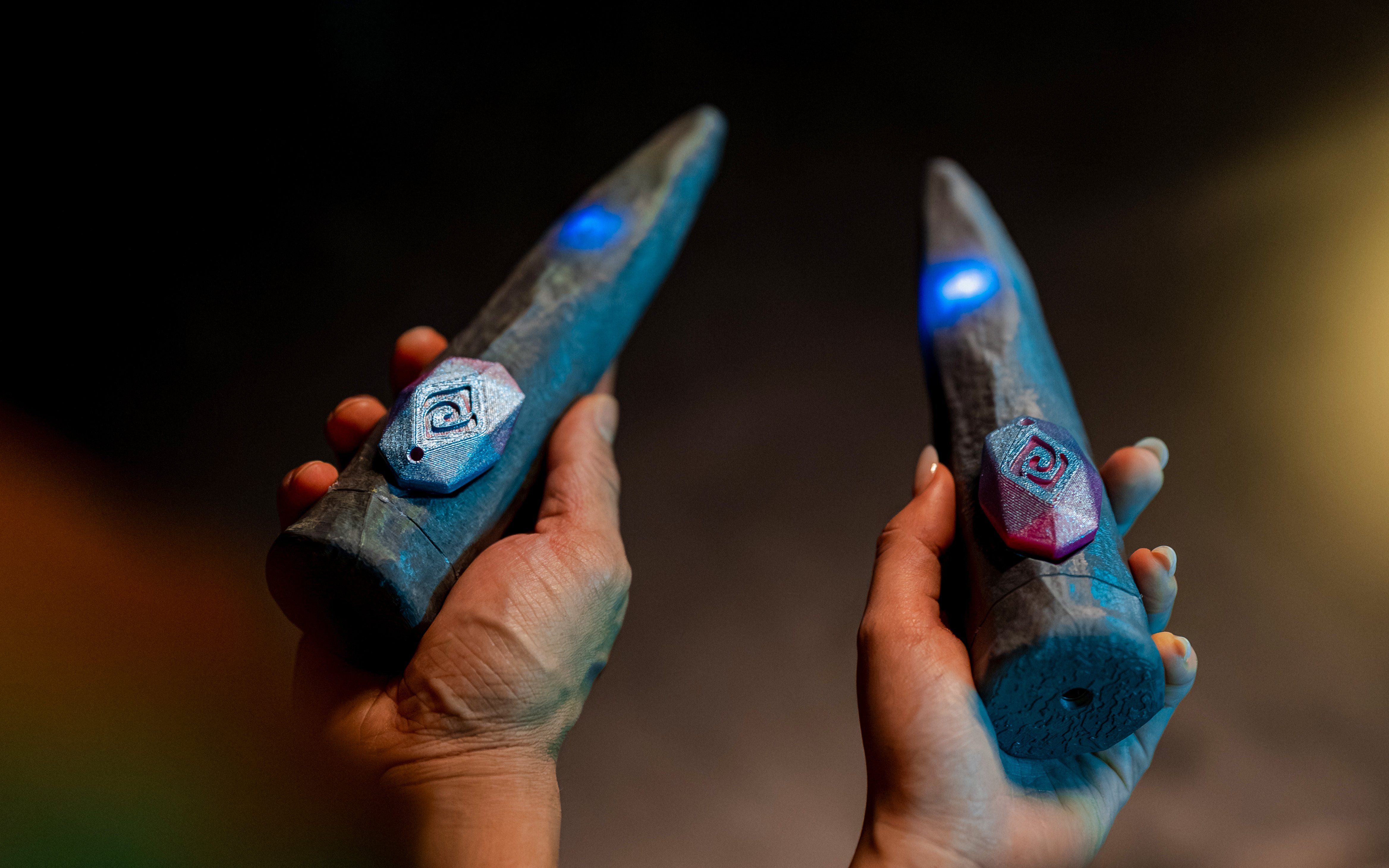 Wearable device for interacting with an exhibit at Enchanted Forest immersive experience.