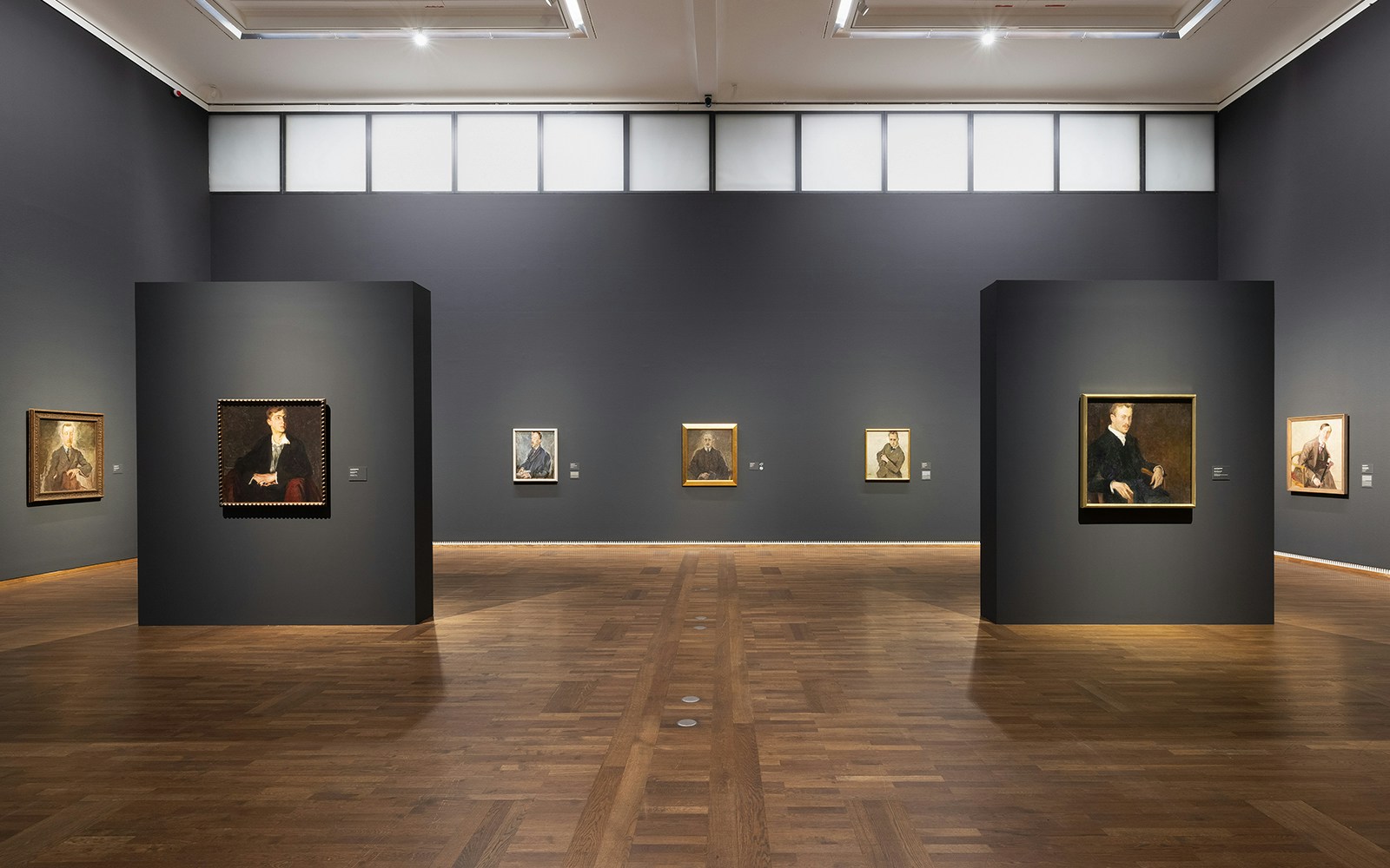 Visitors exploring the art exhibits at the Leopold Museum, one of the stops included in the Combo: Leopold Museum + Kunsthistorisches Museum Tickets tour in Vienna