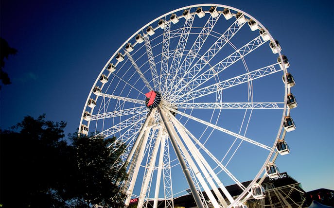 Ferris wheel at South Bank, Brisbane against a clear sky.