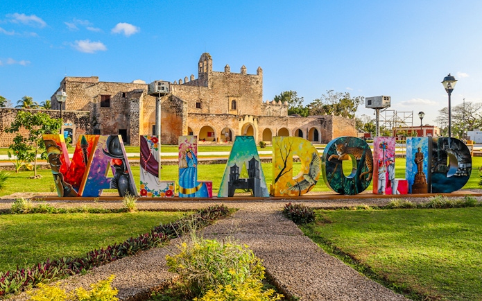 Valladolid sign with colorful artwork in front of San Bernardino Convent, Valladolid, Mexico.
