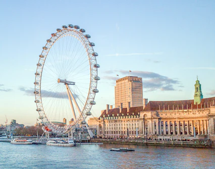 London Eye and County Hall viewed from a river cruise.