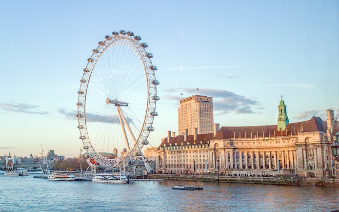 London Eye and County Hall viewed from a river cruise.