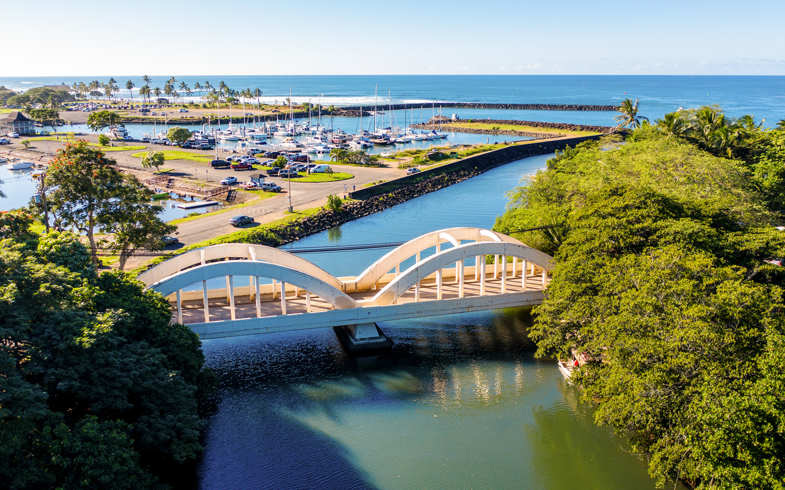 Aerial shot of the river anahulu and the twin arched road bridge in the North Shore town of Haleiwa