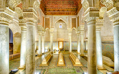 Saadian Tombs interior with ornate columns and intricate tilework in Marrakech, Morocco.