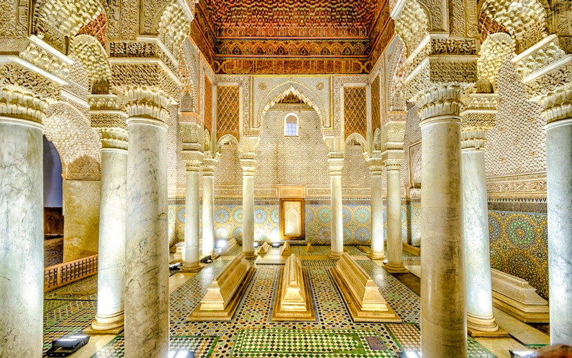 Saadian Tombs interior with ornate columns and intricate tilework in Marrakech, Morocco.