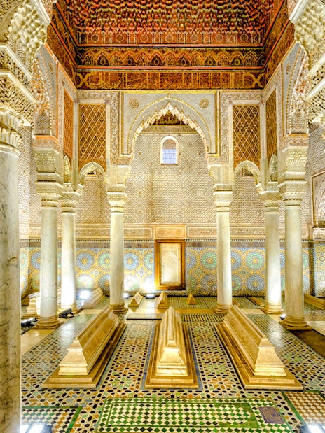 Saadian Tombs interior with ornate columns and intricate tilework in Marrakech, Morocco.