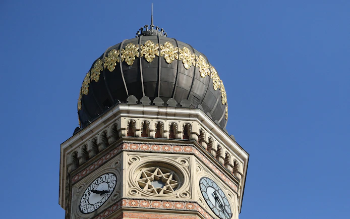 Great Synagogue dome and clock tower detail, featuring ornate gold decorations.