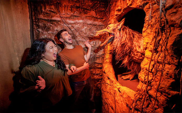Guests reacting to a werewolf at Hollywood Horror Nights, Universal Studios Hollywood, Los Angeles.