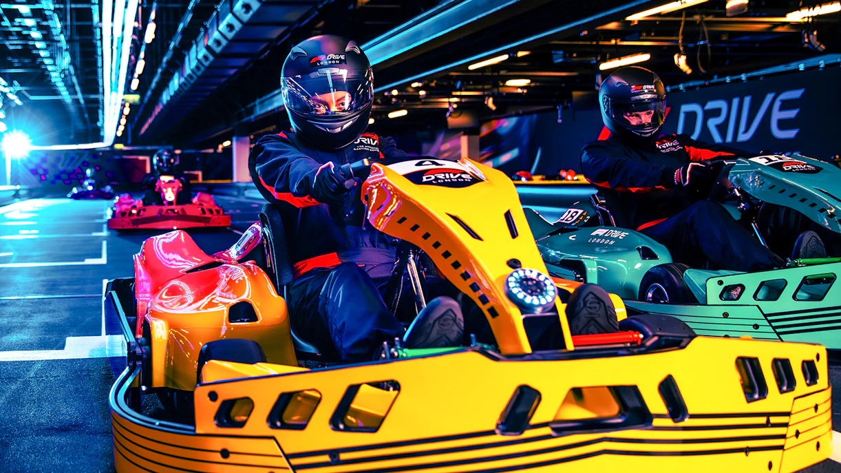 Guests driving go-karts at Elite F1 Drive experience in London.