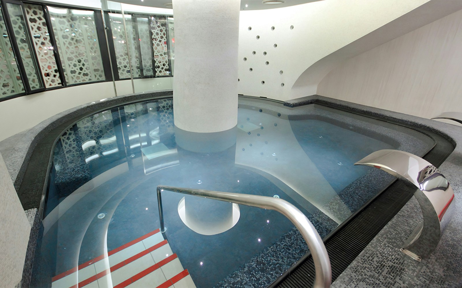 Rudas Bath indoor pool with arched ceilings and natural light in Budapest, Hungary.
