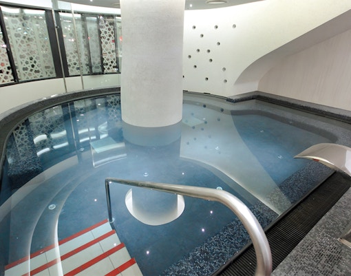 Rudas Bath indoor pool with arched ceilings in Budapest, Hungary.