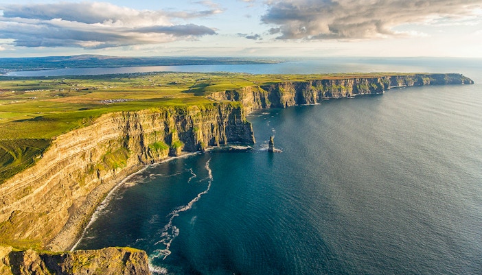 Aerial view of the Cliffs of Moher along the Atlantic Ocean in Ireland.