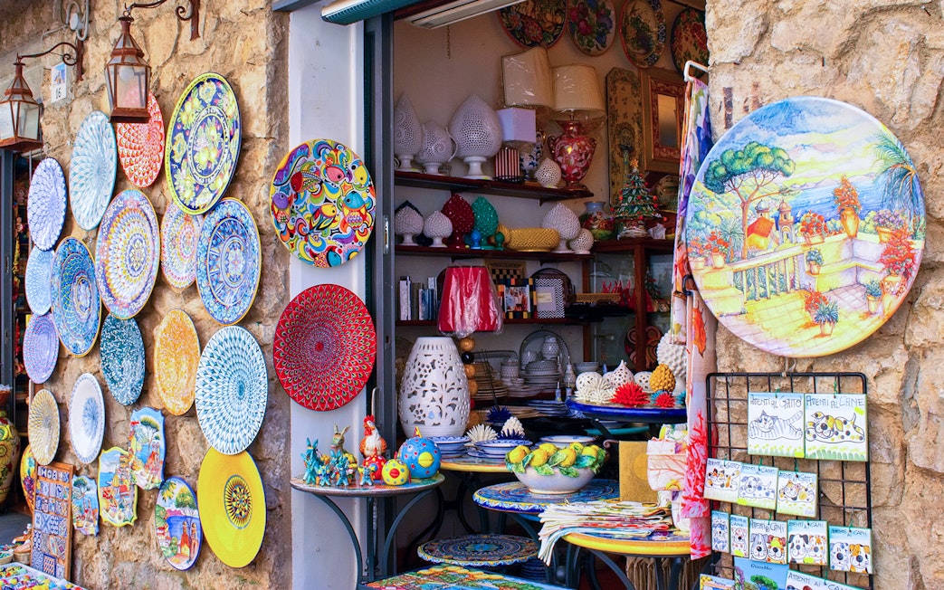 Colorful ceramics displayed at a Sorrento souvenir shop on the Amalfi Coast.