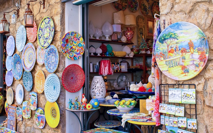 Colorful ceramics displayed at a Sorrento souvenir shop on the Amalfi Coast.