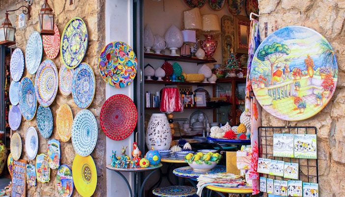 Sorrento souvenir shop with colorful ceramics on display, Amalfi Coast.
