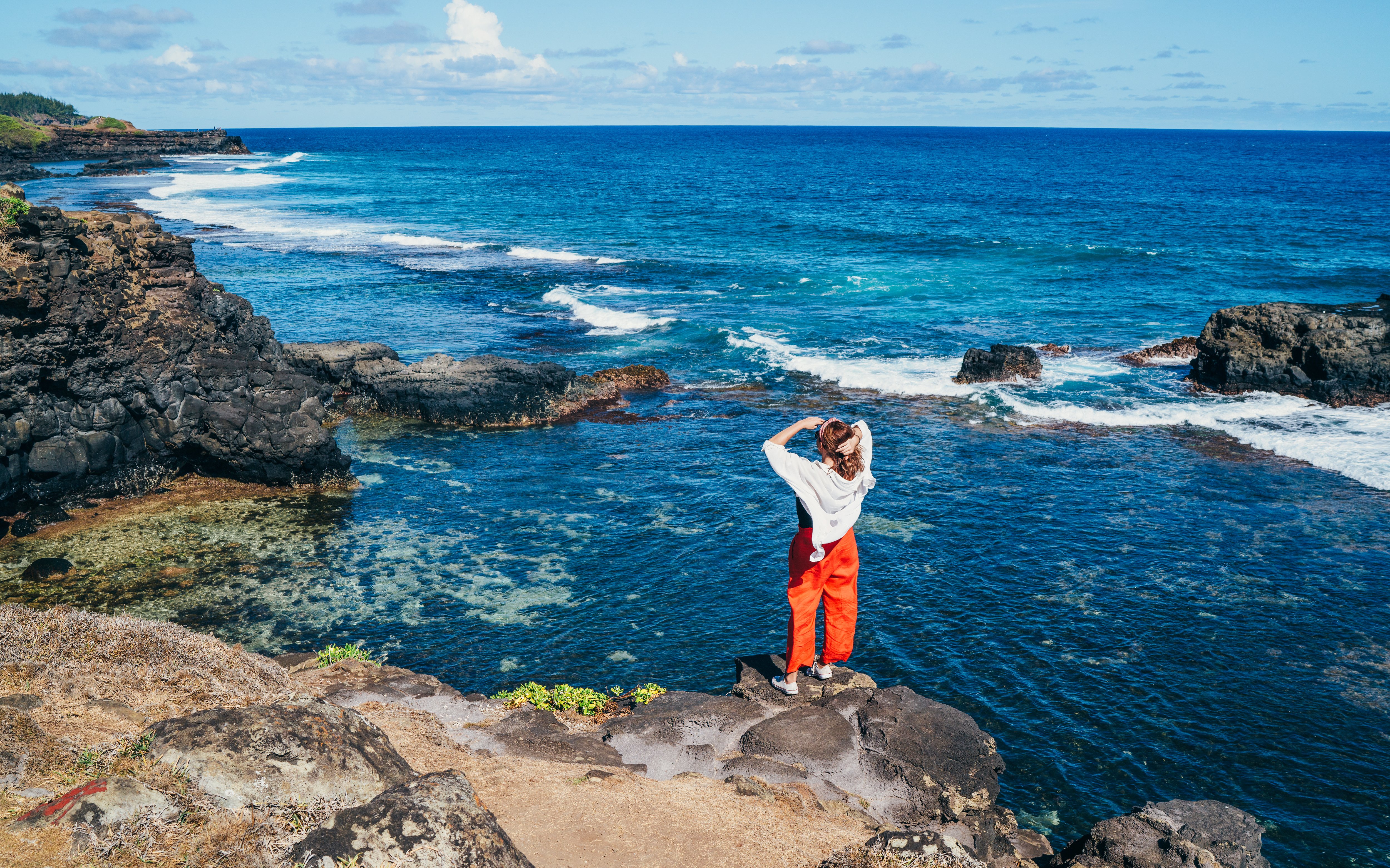 Person viewing ocean from Gris Gris viewpoint, extreme south of Mauritius island.