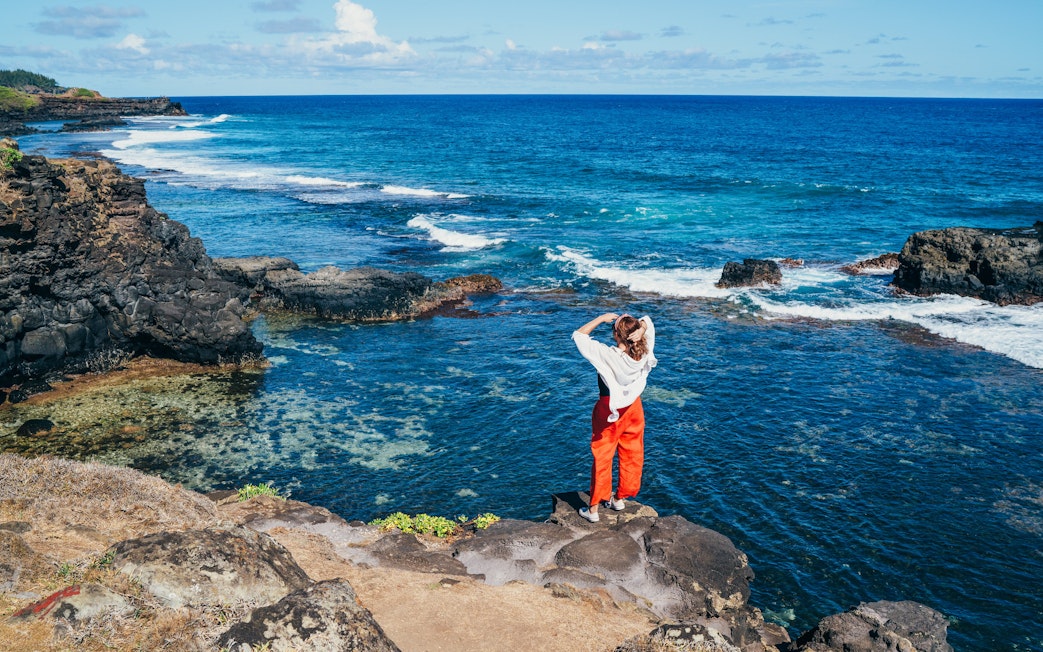 Person viewing ocean from Gris Gris viewpoint, extreme south of Mauritius island.