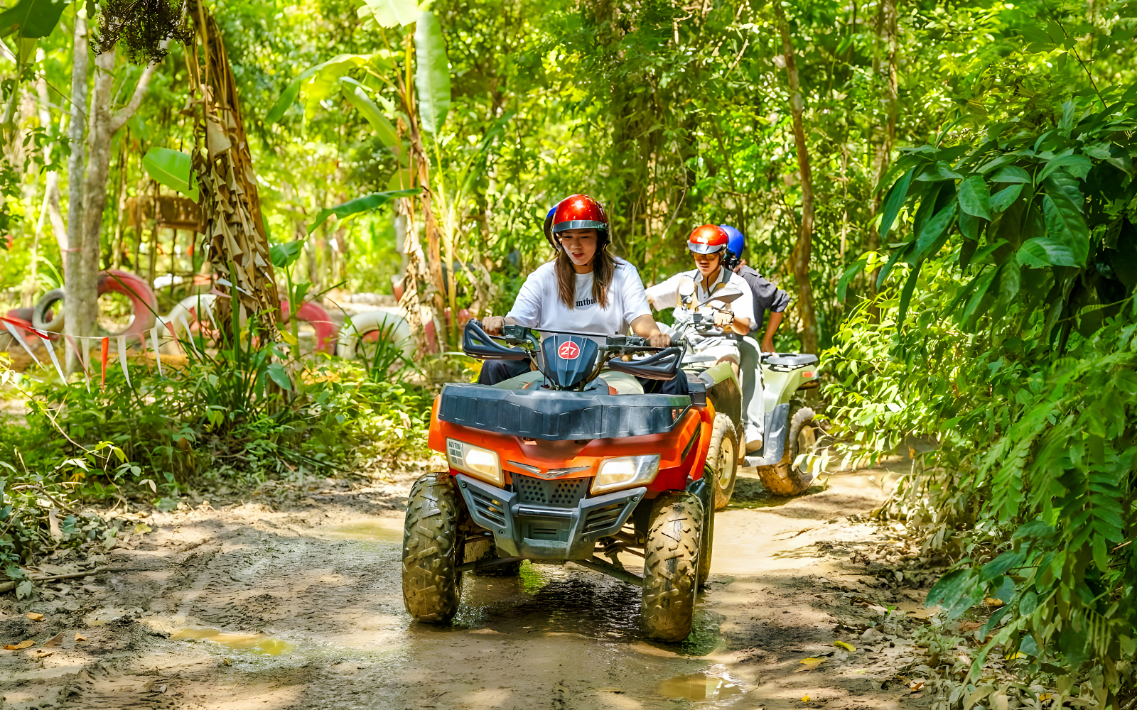 Quad biking adventure through lush jungle at Flying Hanuman, Phuket.