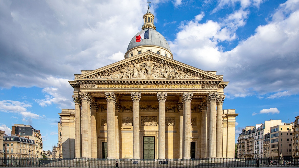 View of the historic Paris Pantheon under a clear blue sky, a must-visit landmark on a Paris city tour