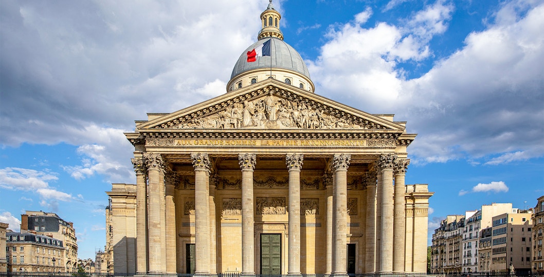 View of the historic Paris Pantheon under a clear blue sky, a must-visit landmark on a Paris city tour