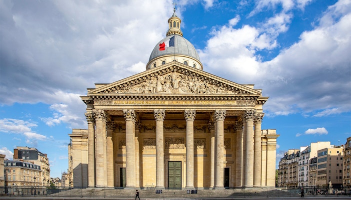 View of the historic Paris Pantheon under a clear blue sky, a must-visit landmark on a Paris city tour