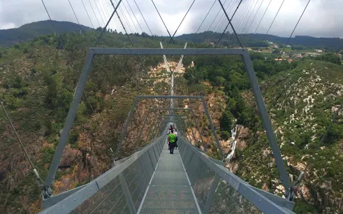 Guided tour on 516 Arouca Suspension Bridge with view of Paiva Walkways, Portugal.