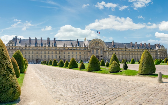 Les Invalides northern facade with manicured gardens, Paris, France.