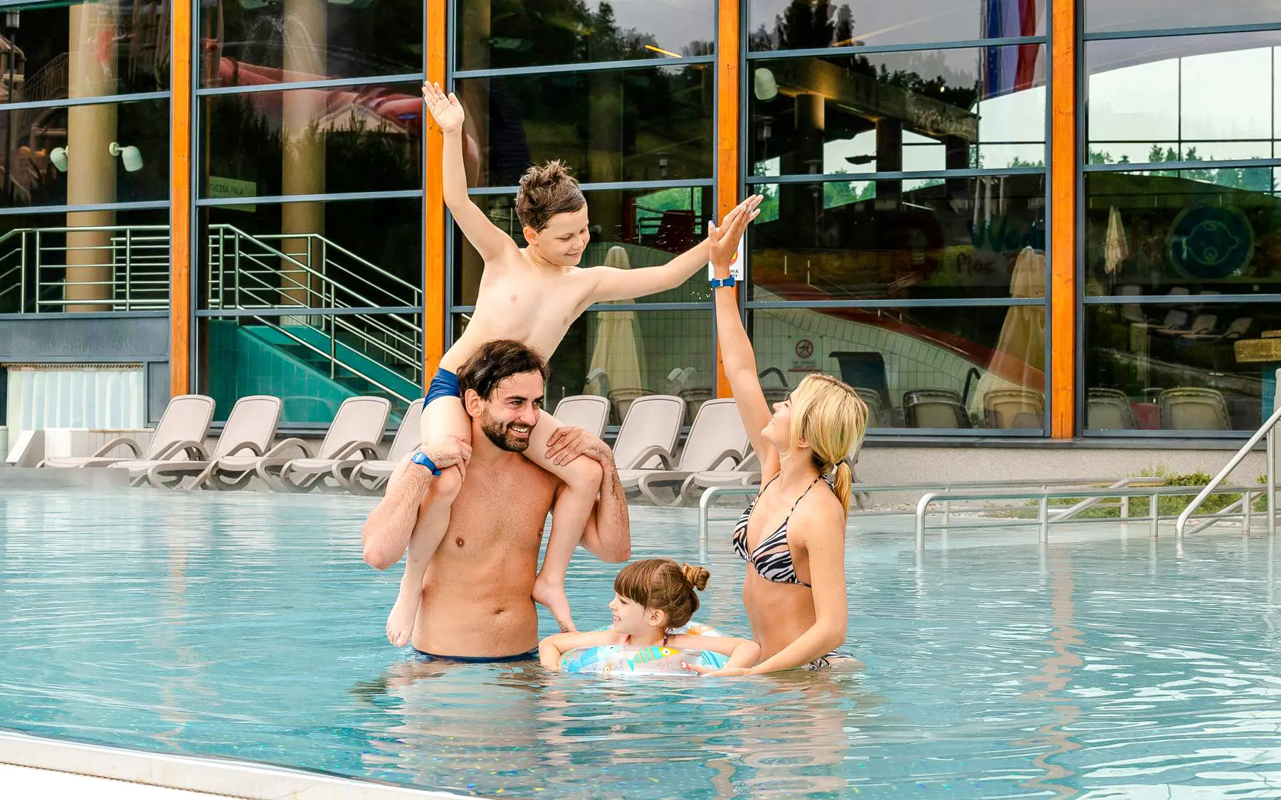 Family enjoying the pool at Terma Bania in Białka Tatrzańska, near Zakopane.