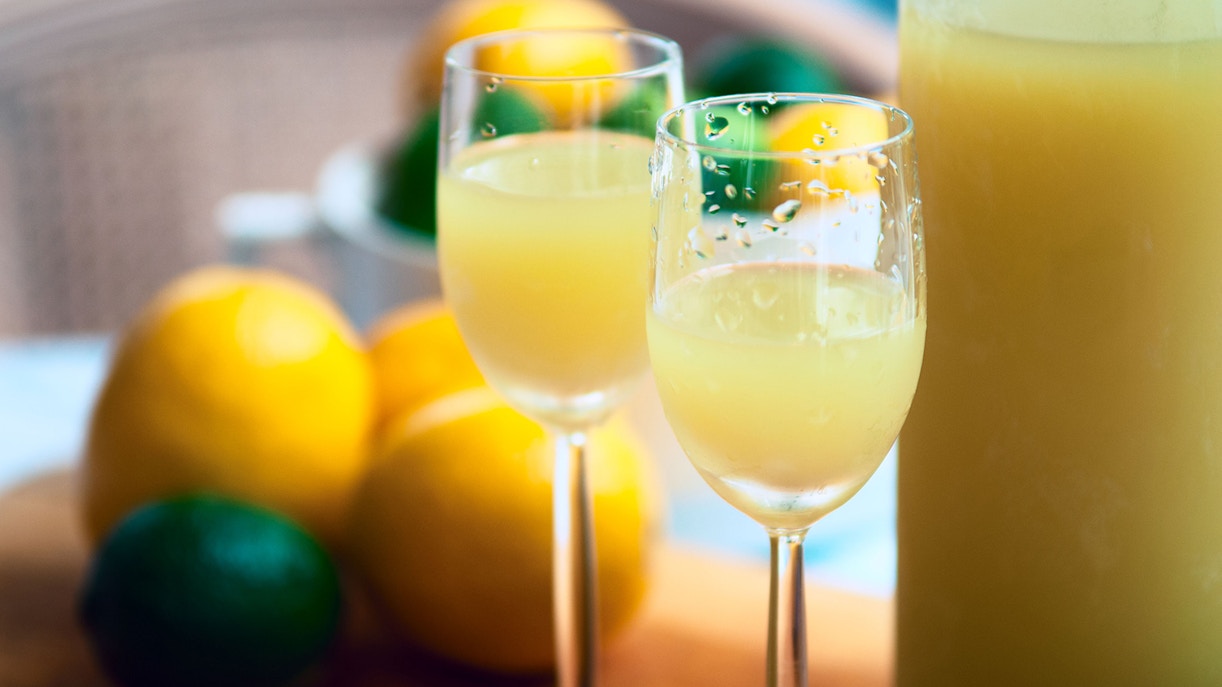 Limoncello glasses on a table in Naples, Italy.
