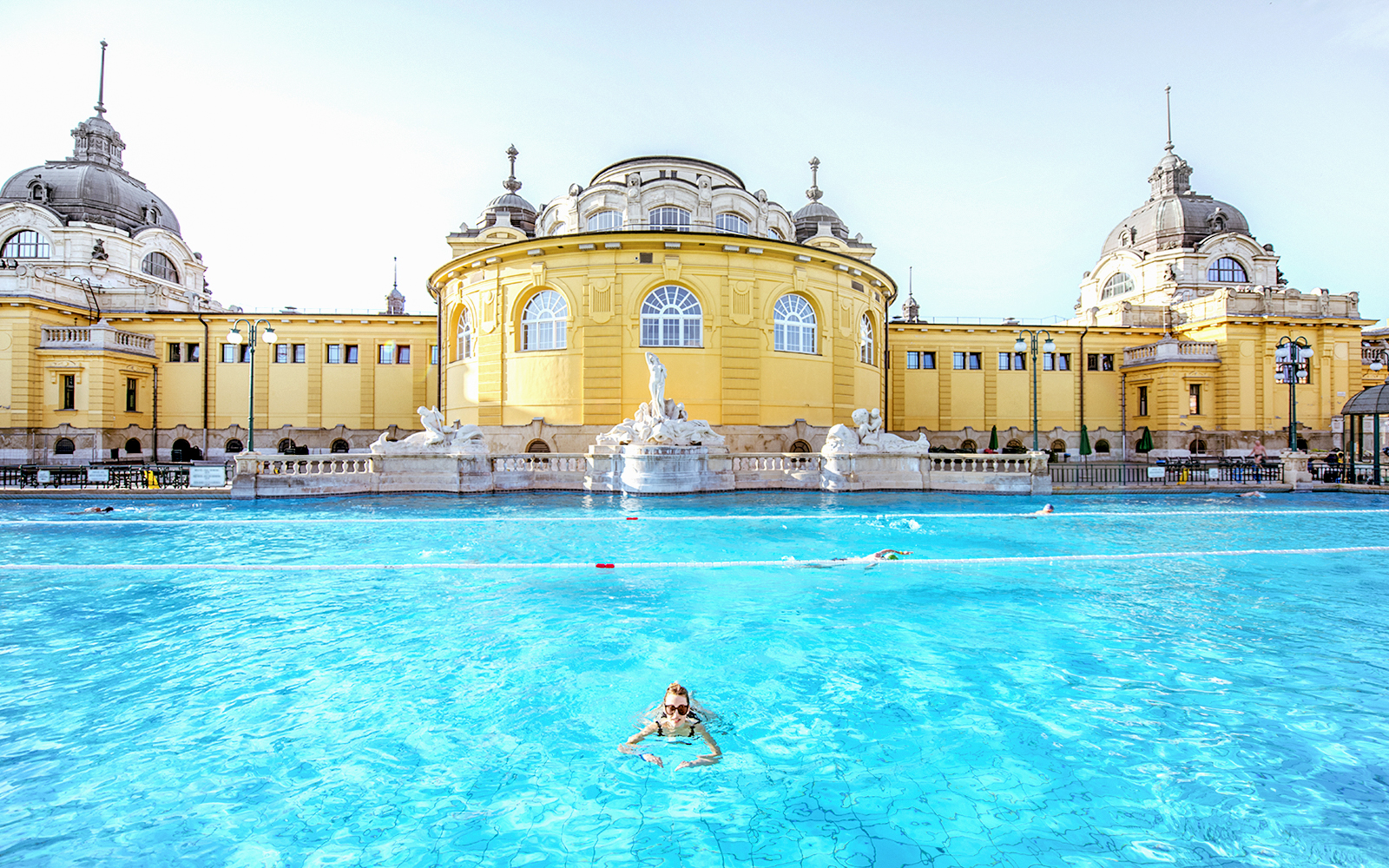 Guests swimming at Széchenyi Spa in Budapest, Hungary.