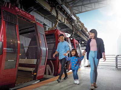 Family getting on a cable car