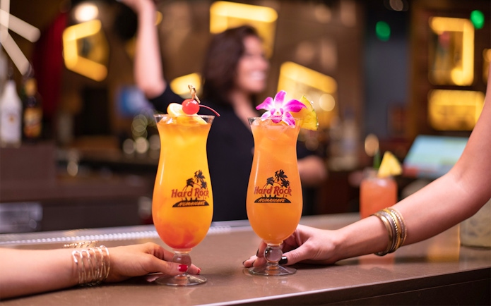 Cocktails being served at Hard Rock Cafe Milan bar.