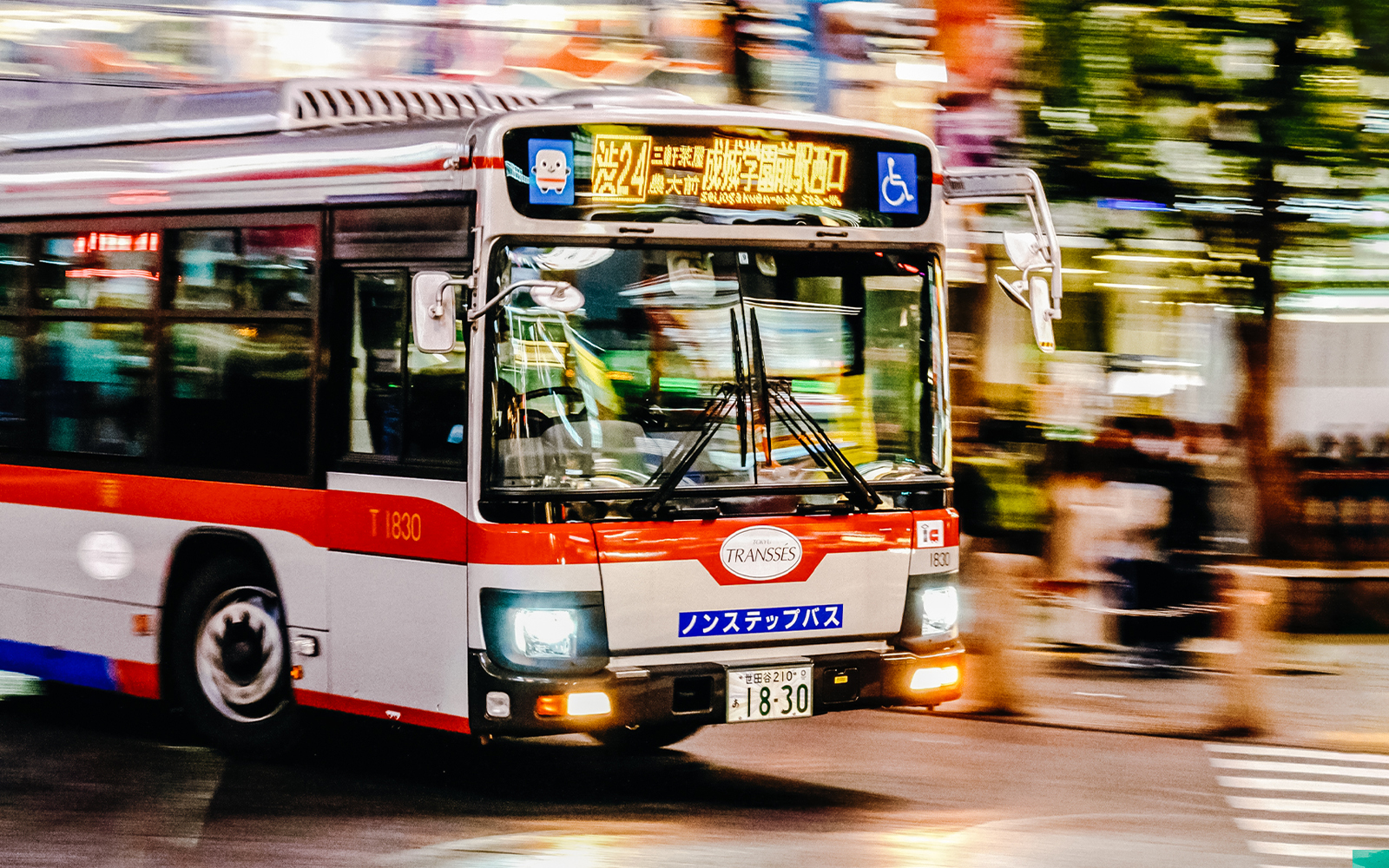 Red and white bus in Shibuya, Tokyo, Japan