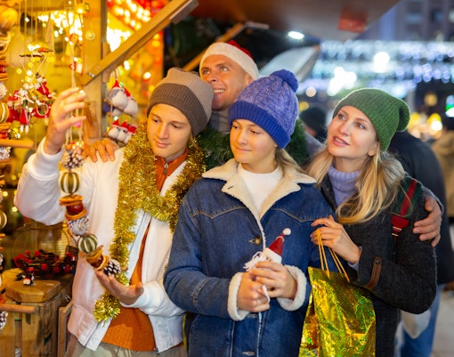 Christmas market in barcelona with festive stalls and holiday decorations.
